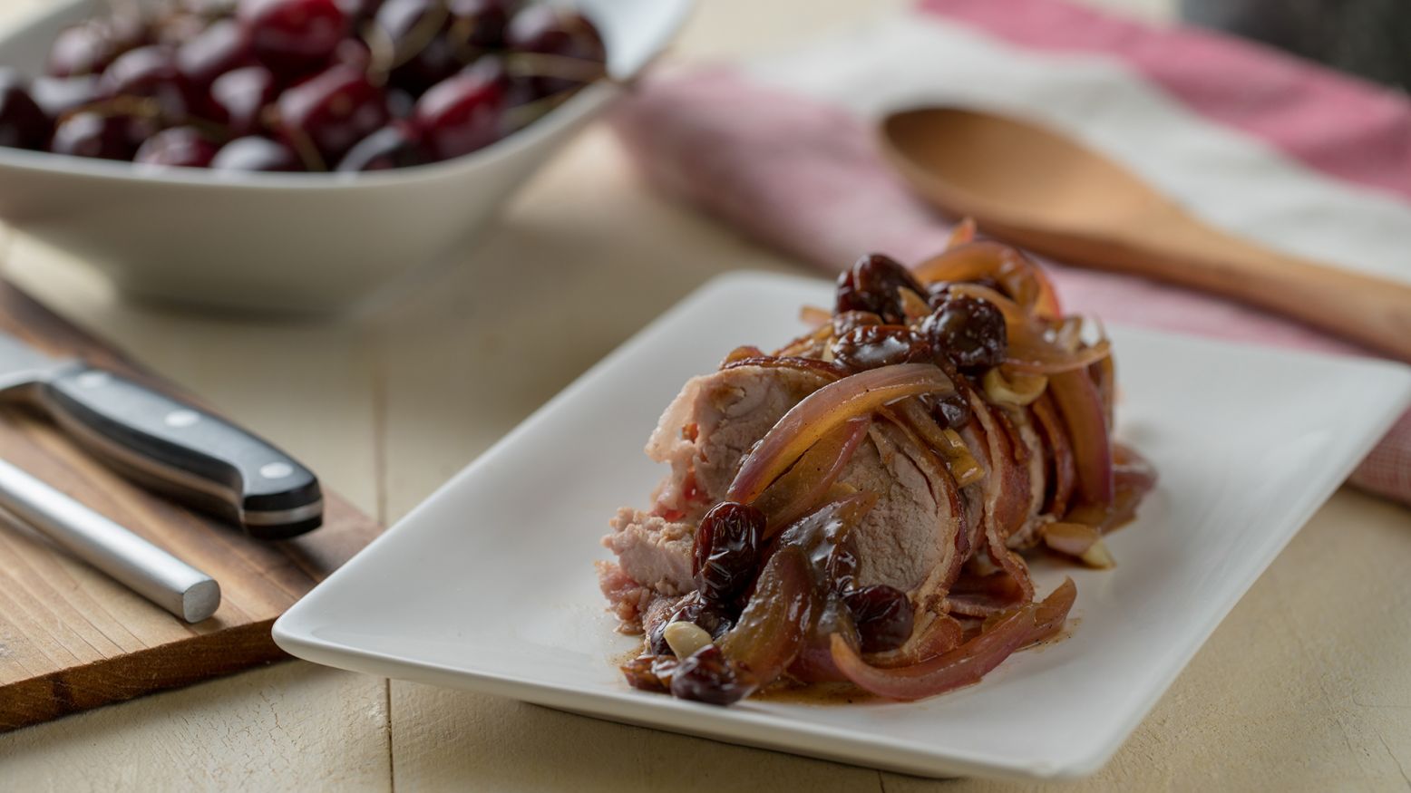 Maple Bacon Wrapped Pork with Rosemary Cherry Sauce
