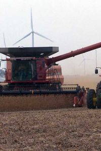 Combine harvesting an Iowa farm field