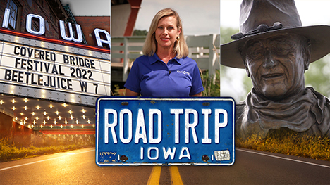 An IOWA movie marquee that says, "COVERED BRIDGE FESTIVAL 2022, BEETLEJUICE W 7", Brooke Kohlsdorf (host), a statue of movie star John Wayne and Road Trip Iowa logo above a sunlit two lane highway.