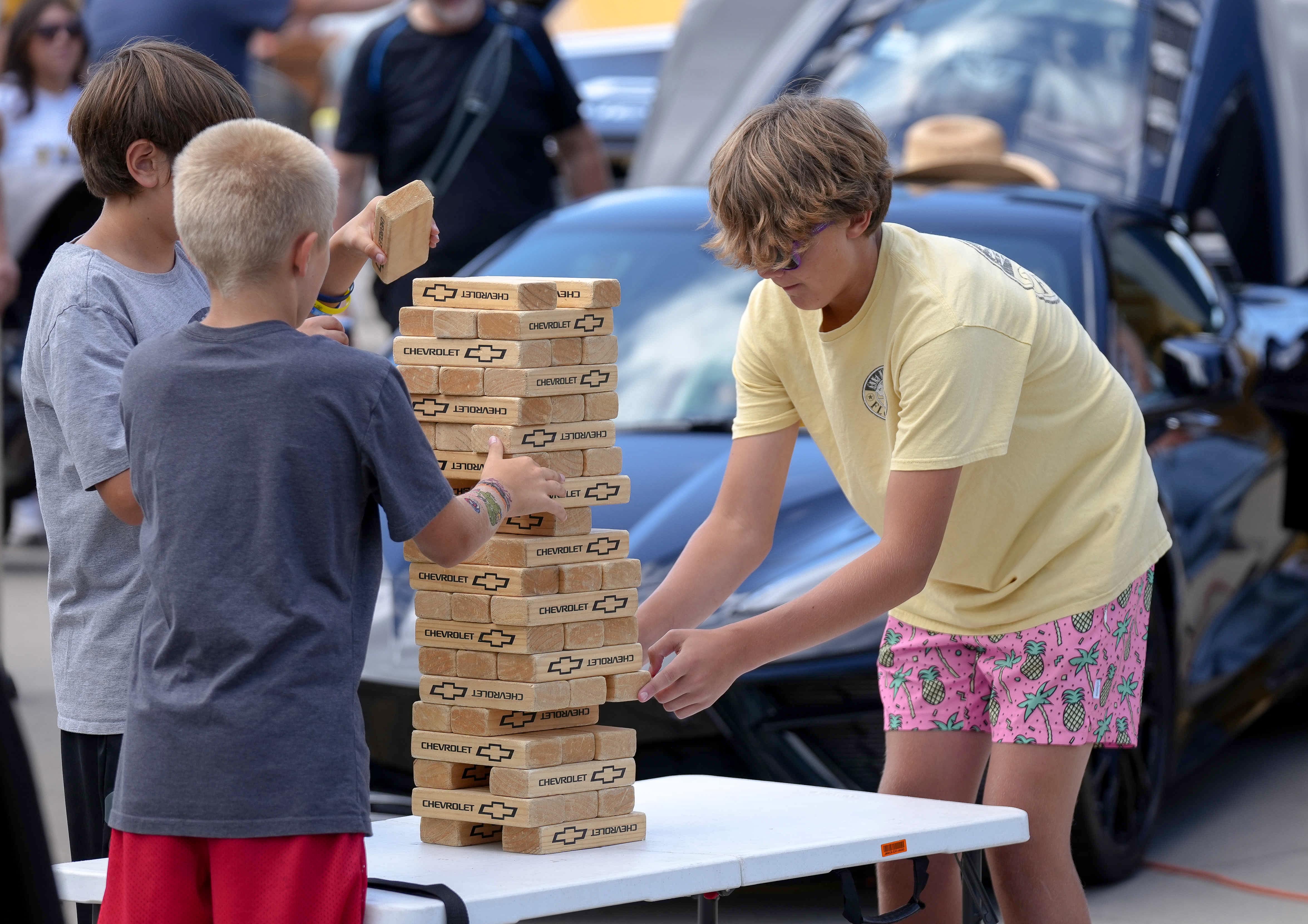 Kids playing giant Jenga at the Iowa State Fair