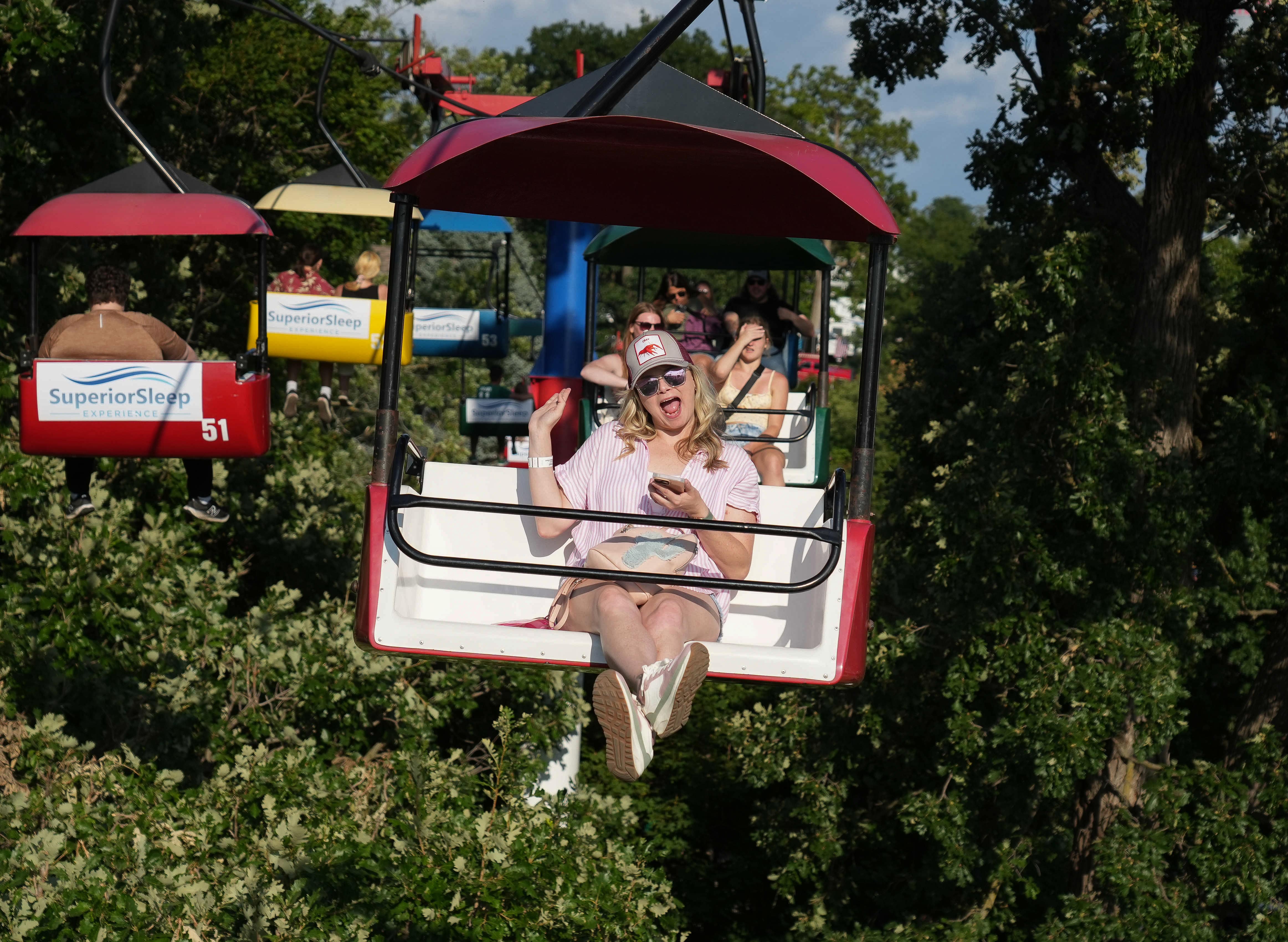 Joyful woman on the SkyGlider at the Iowa State Fair