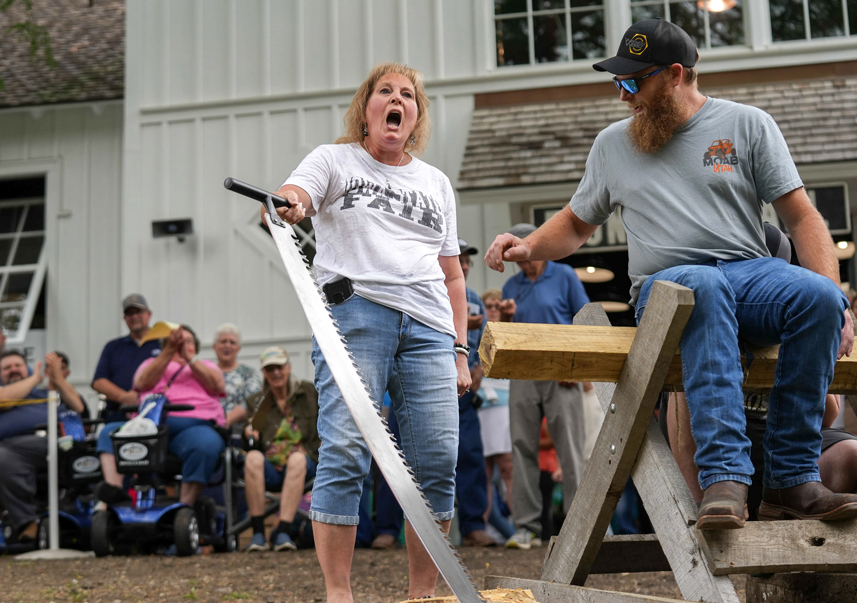 Manual Timber Sports participants welcomes an enthusiastic crowd to watch the fun.