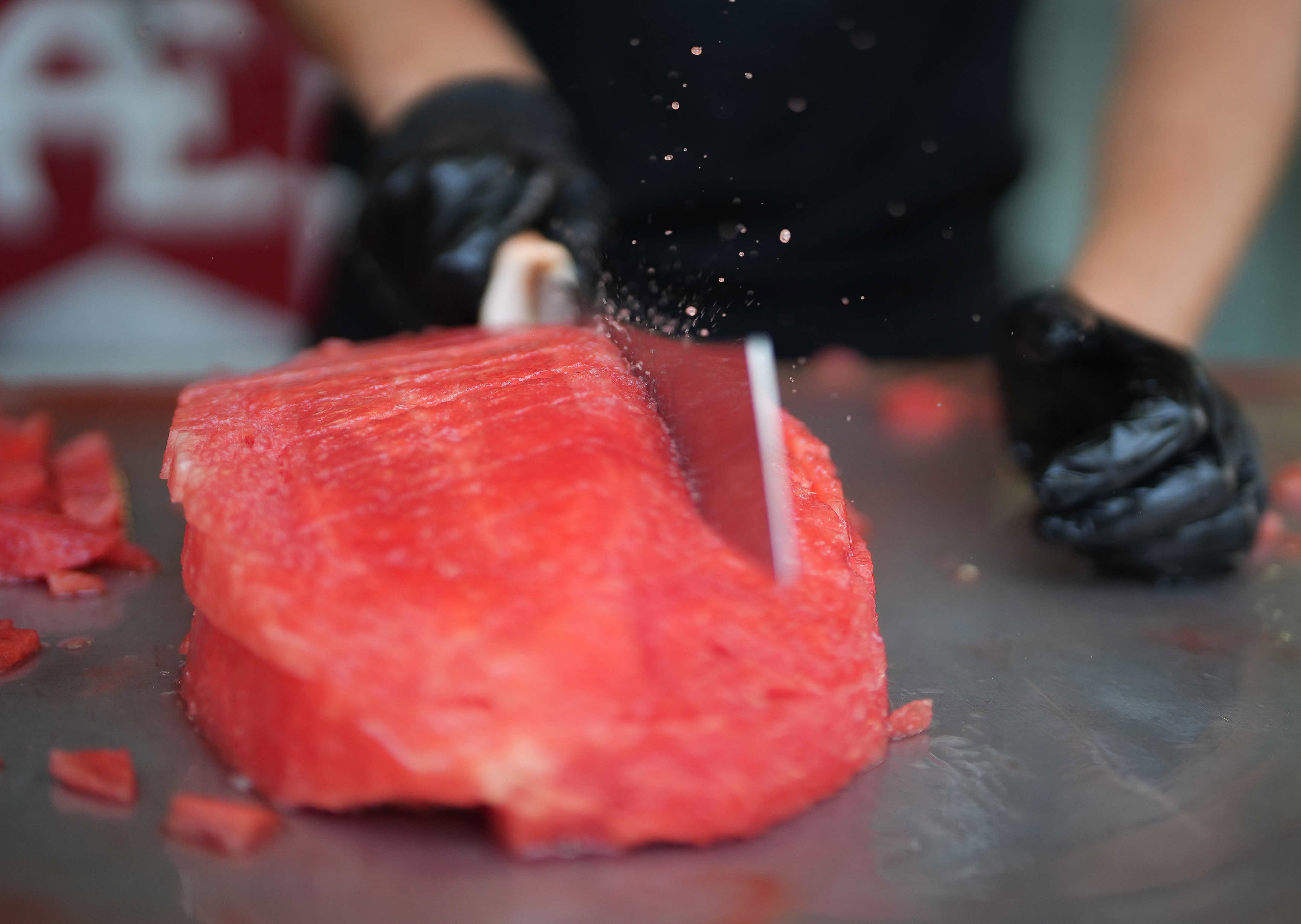 Preparing watermelon at Beattie’s to serve the Saturday crowd on one of the warmer days of the 2024 Fair.