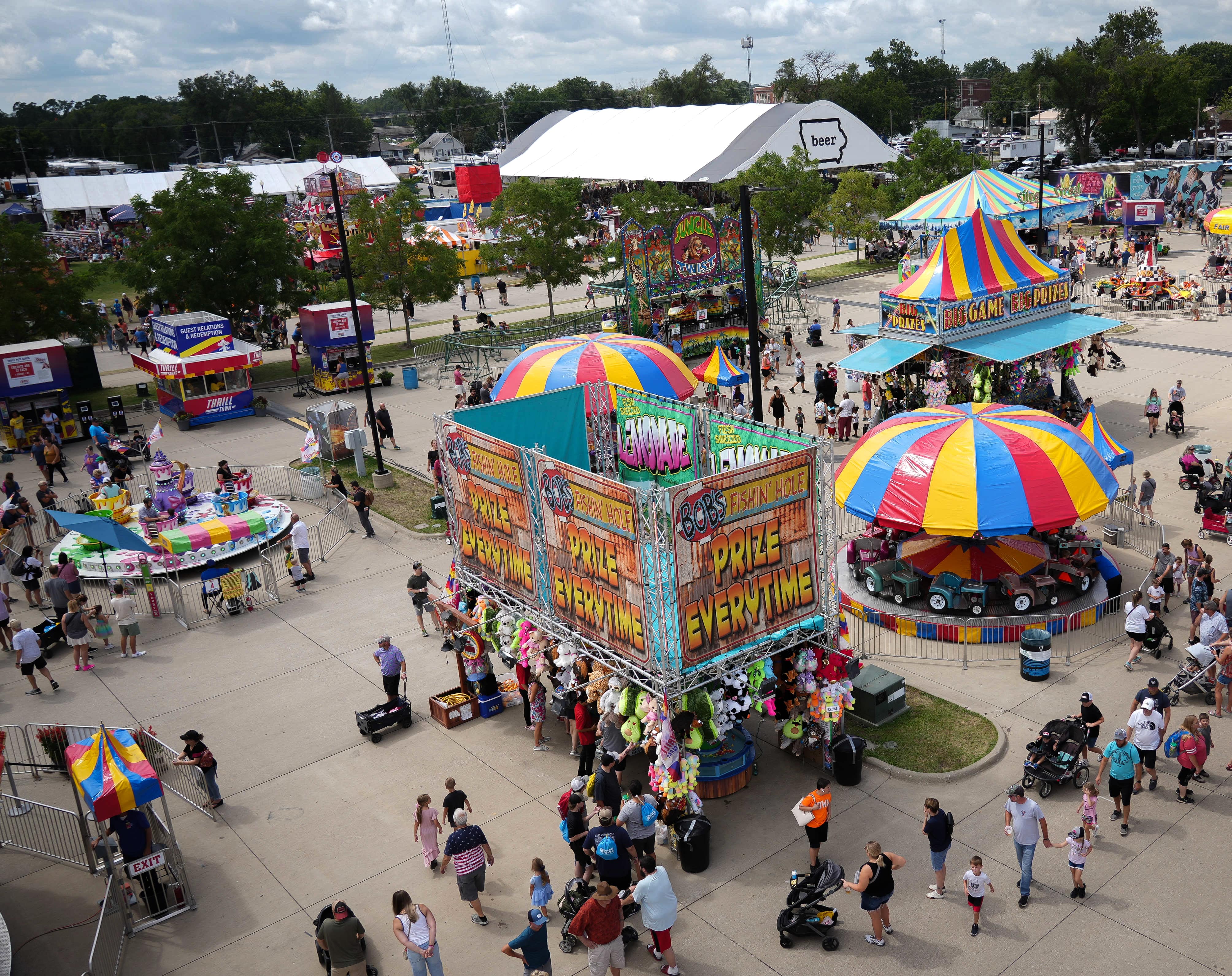 Fans of all ages enjoying the games and rides offered at Thrill Town.