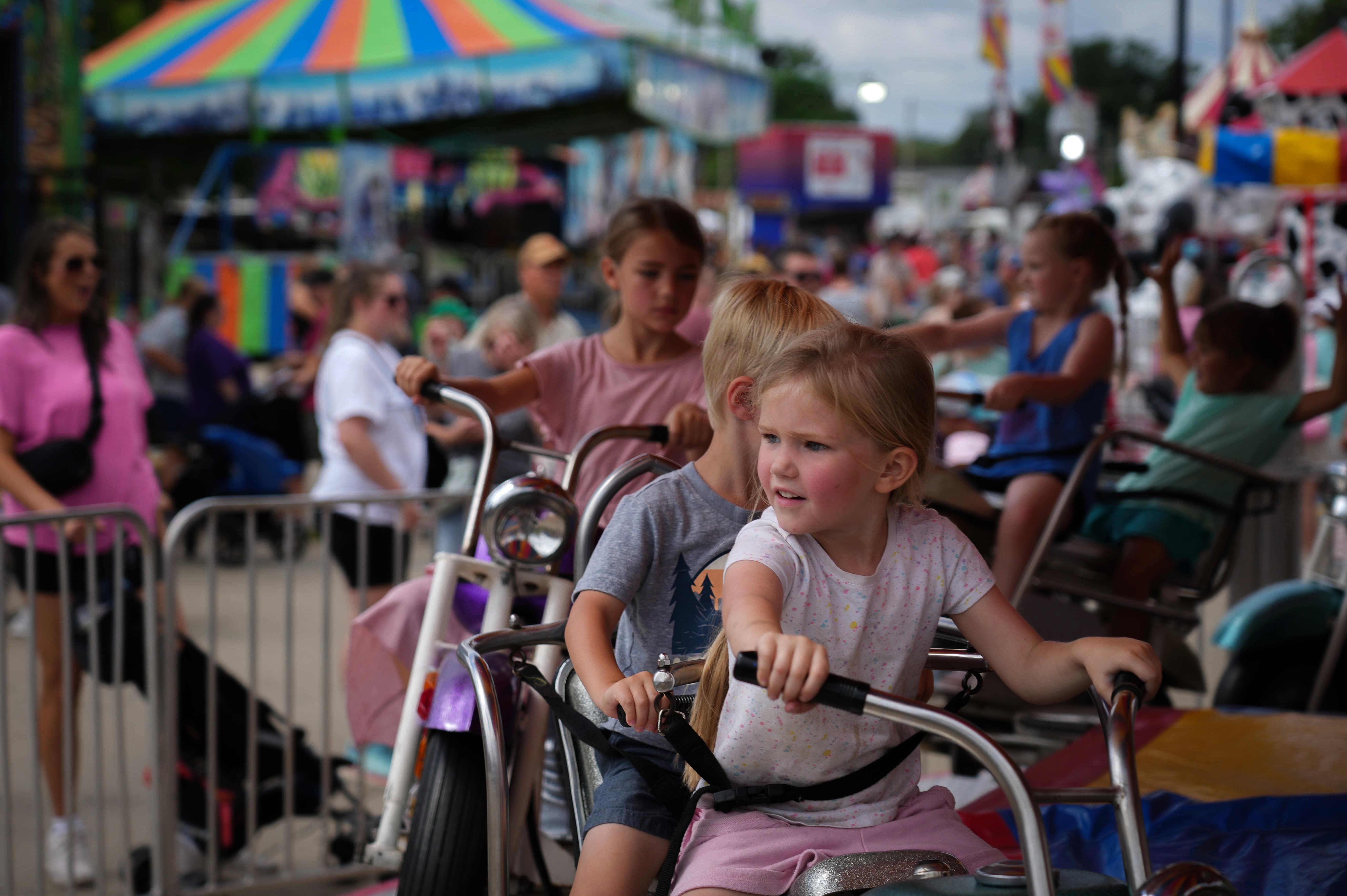 Kids enjoying the rides at Thrill Town.