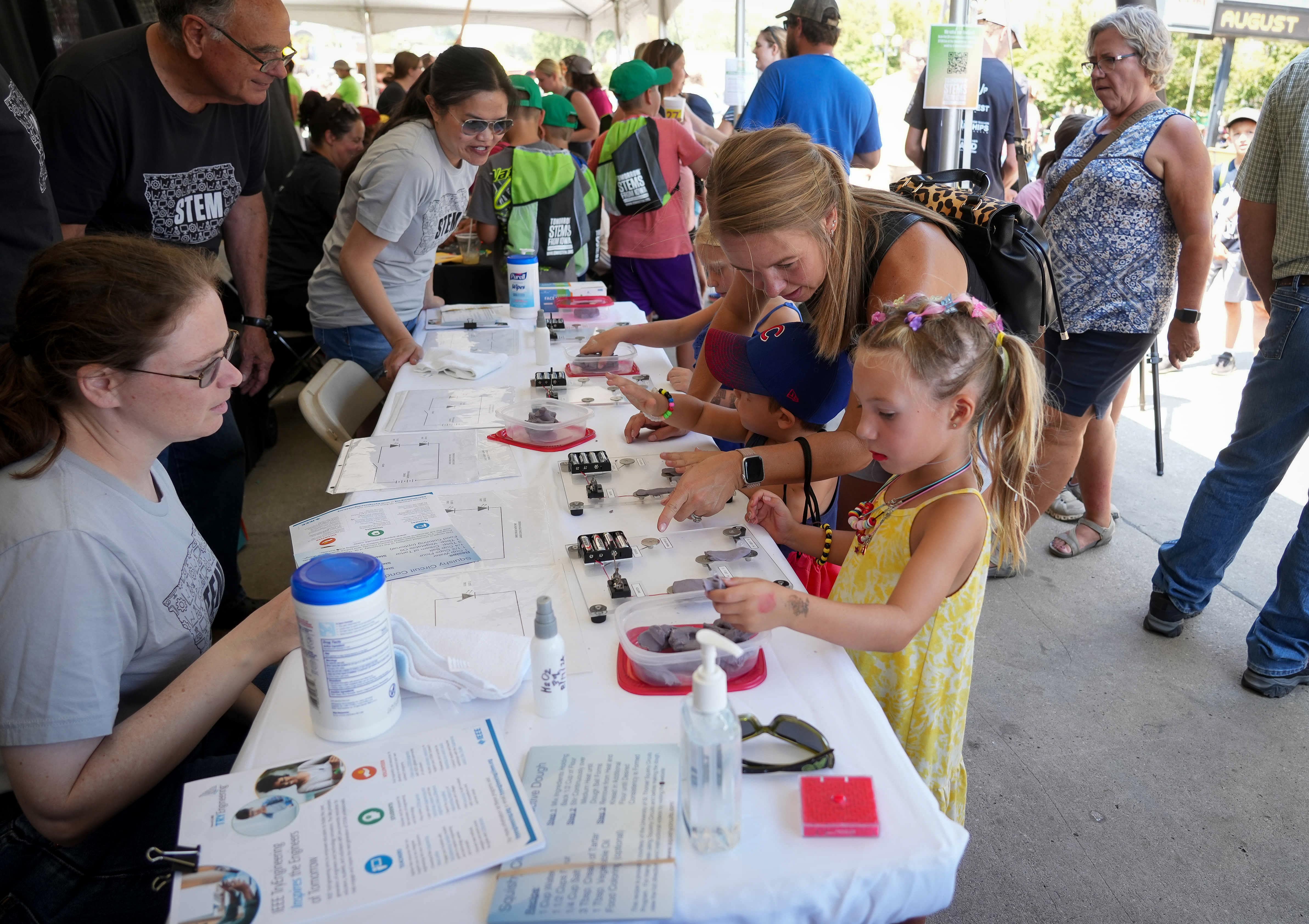 Young attendees enjoying the STEM Day at the Iowa State Fair.