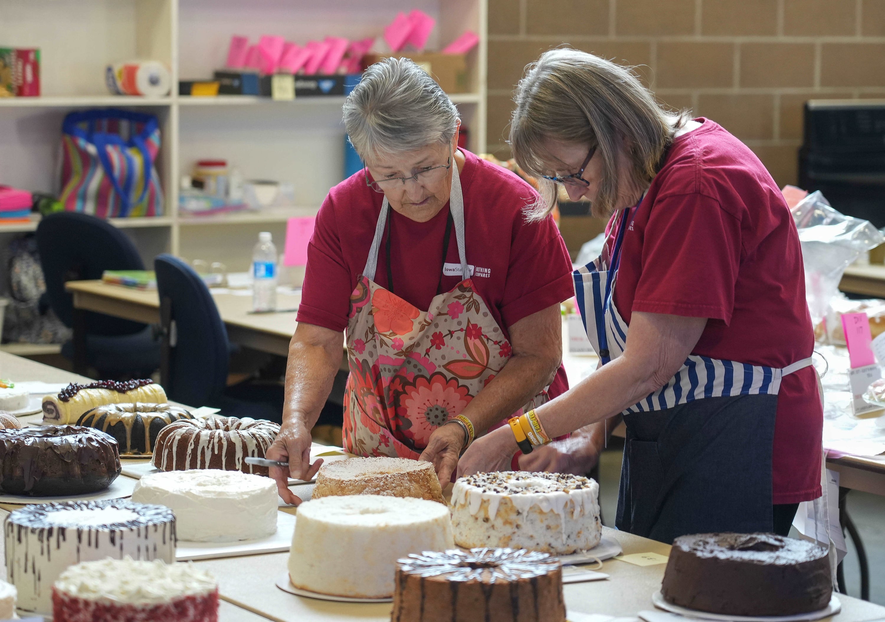 Two women helping with the food judging contests in the Elwell Family Food Center