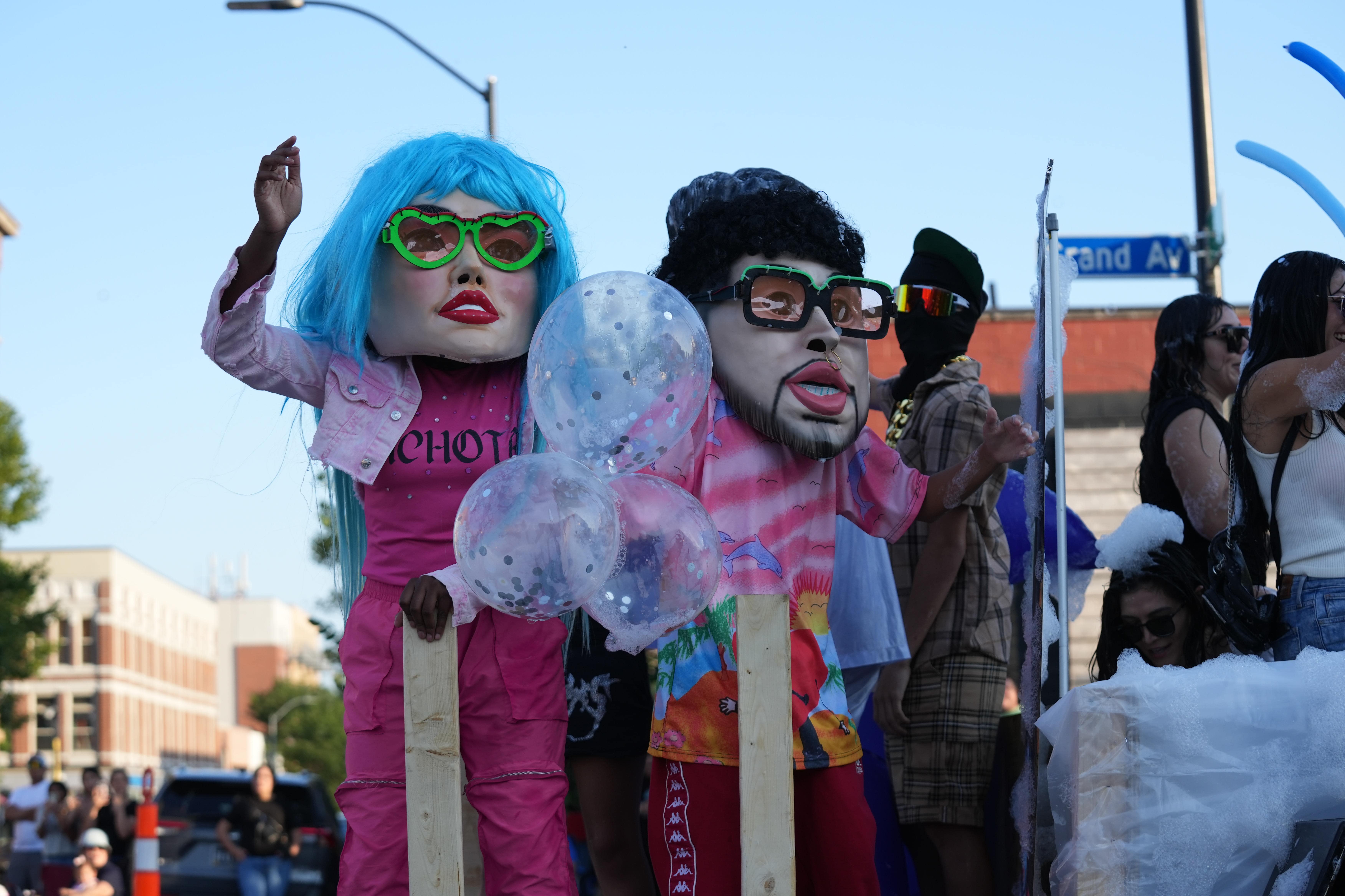 Colorful costumes, bubbles and more on the El Chato float.