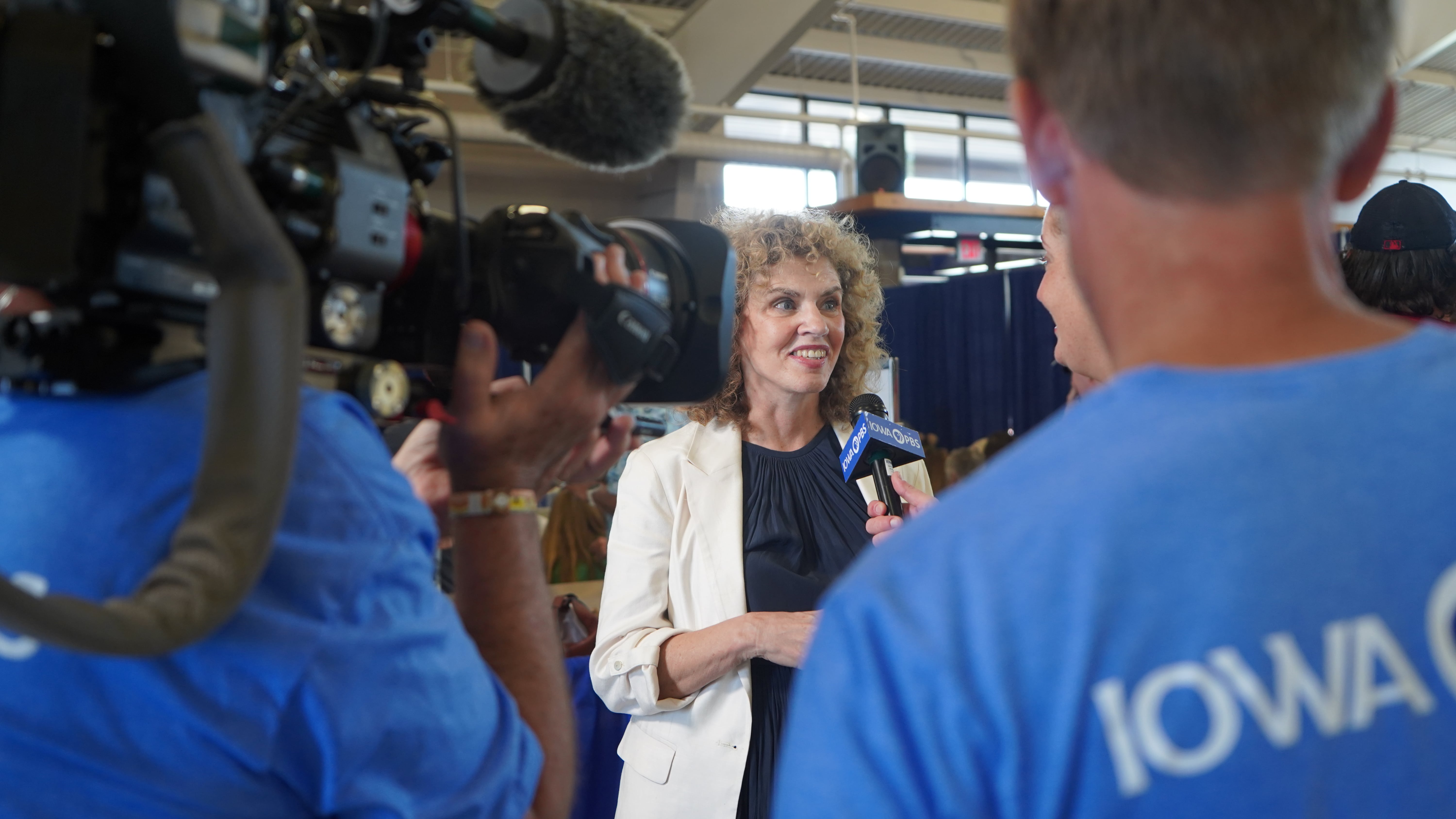 Interviewing a woman at the Iowa State Fair