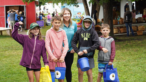 Abby Brown with kids at Little Hands on the Farm