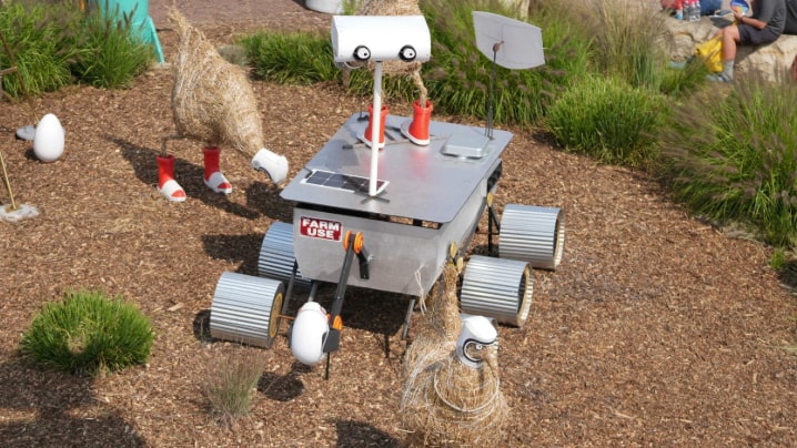 Outdoor display at the Iowa State Fair that appears to include a robot