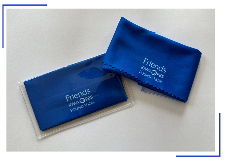 A royal blue lens cloth with the Friends Iowa PBS Foundation logo in white