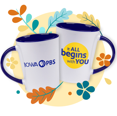 White ceramic mug with a navy blue interior and handle with the Iowa PBS logo on one side and the words It all beings with you on the other side