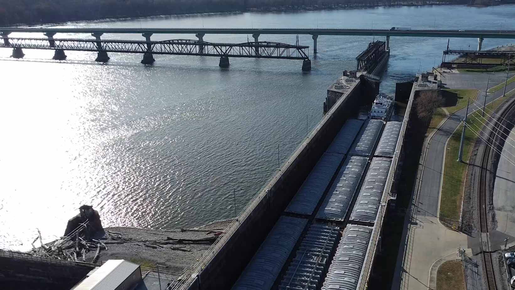 A barge passes through the lock at the Keokuk Lock and Dam