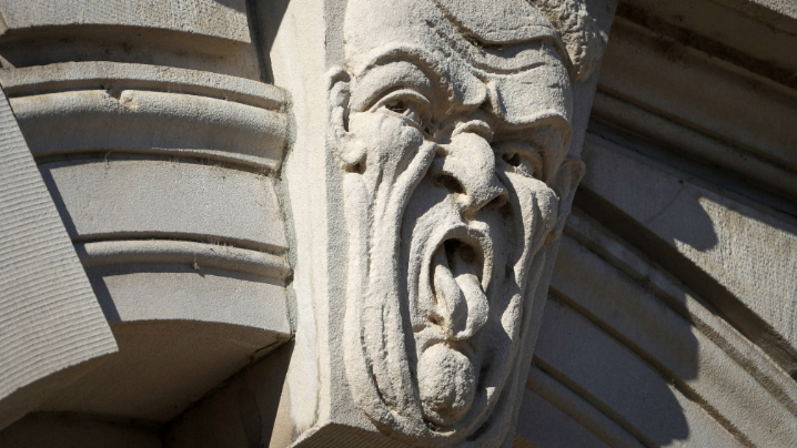 The Polk County Courthouse in Des Moines was designed by the Proudfoot and Bird architecture firm in 1902 (completed in 1906) and has 28 grotesques along the second floor windows.