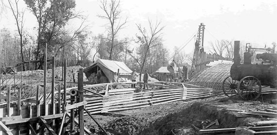 Men Constructing Bridge