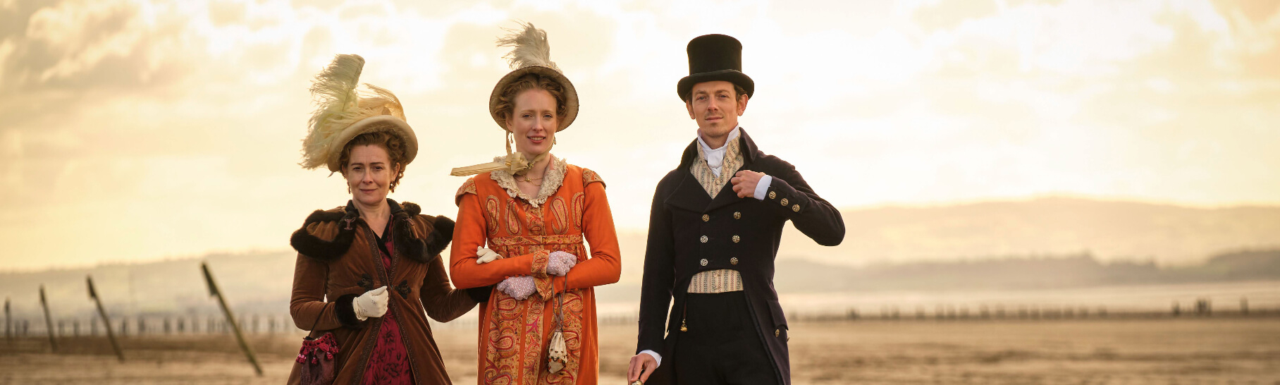 Sanditon Season 3 image of three Regency era characters on the beach