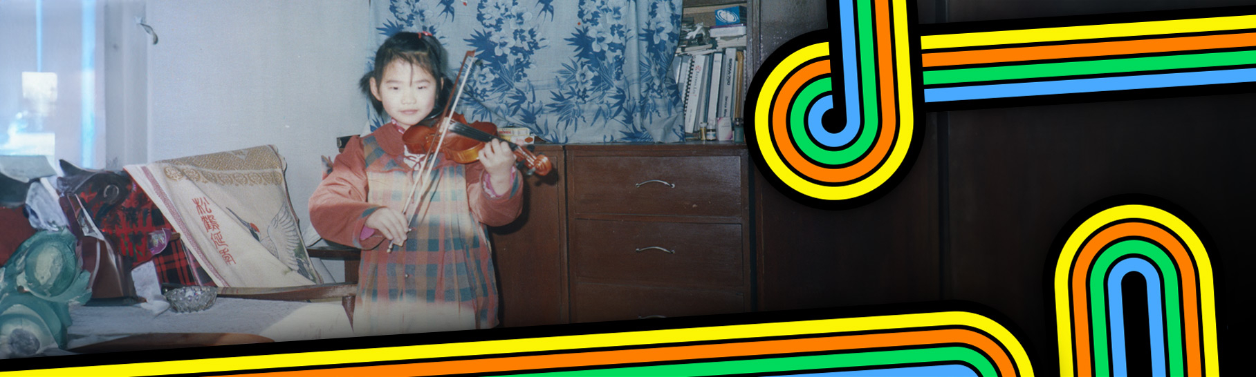 Little girl playing a violin in a vintage photo