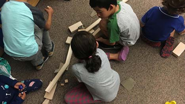 image of children playing with ramps and pathways 