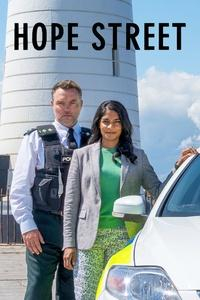 Characters, Inspector Finn O'Hare and DC Leila Hussain face the camera (with a lighthouse at their backs) while standing next to a police car.