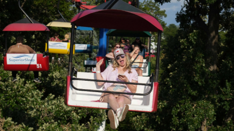 joyful woman riding a SkyGlider