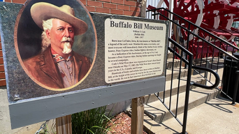 A sign with an image of Buffalo Bill Cody.