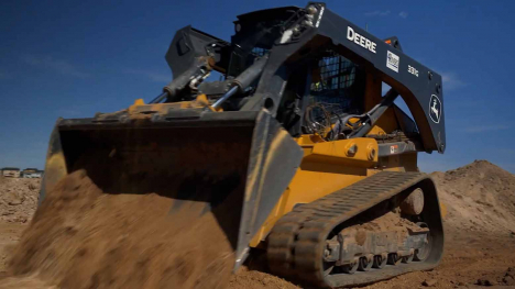 skid steer moving dirt