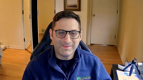 Scott Aaronson at his desk